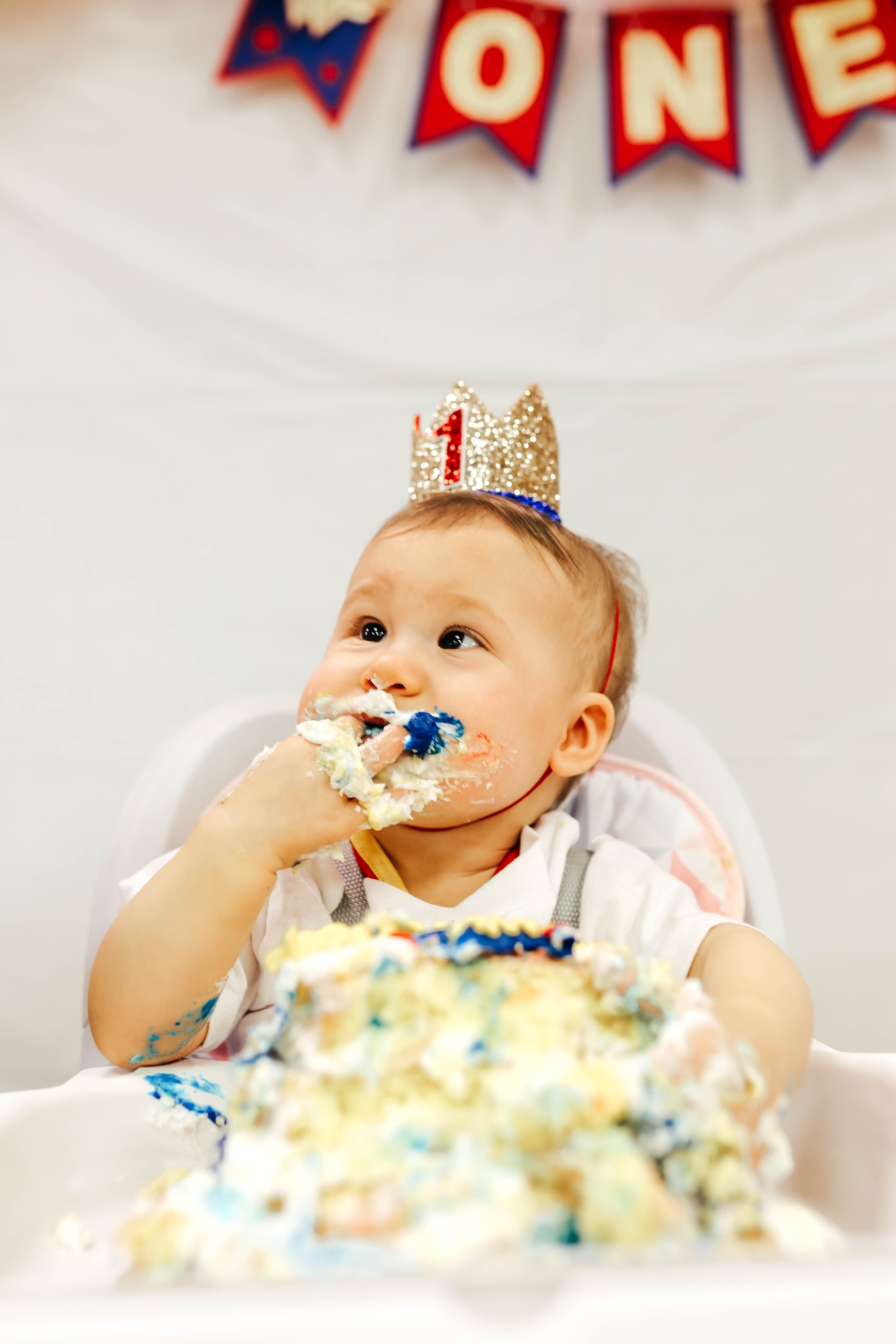 ONEder Woman 1st Birthdy Party for Olivia Grace - eating smash cake on Coming Up Roses