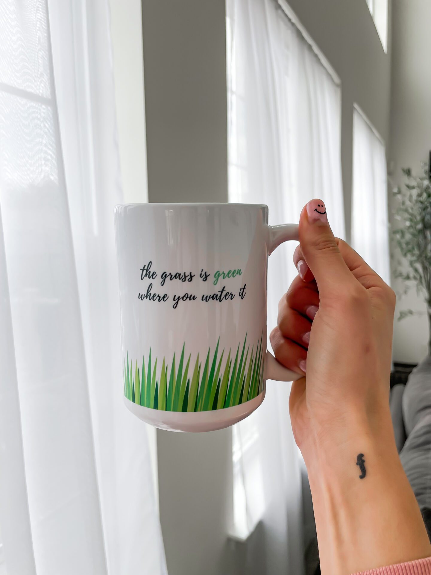 THE GRASS IS GREEN WHERE YOU WATER IT mug - MANTRA MUGS - on Coming Up Roses